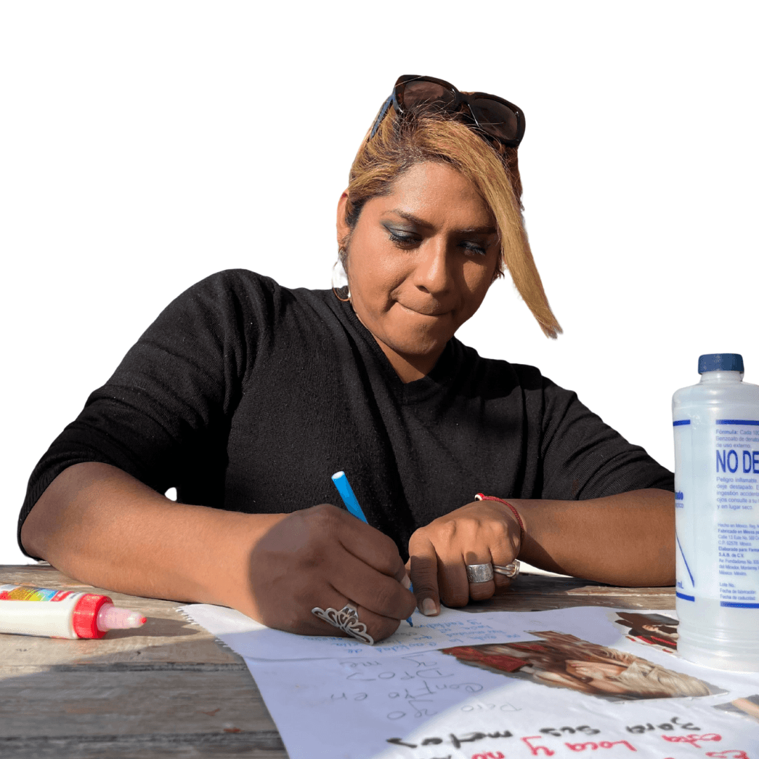 Smiling woman giving a piggyback ride to a laughing young girl.